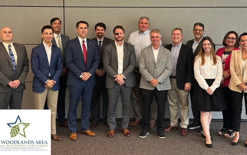 Group photo at a Woodlands Area Economic Development Partnership event, with attendees representing Cellipont Bioservices and the broader business community supporting biotech and advanced therapy growth in the region.